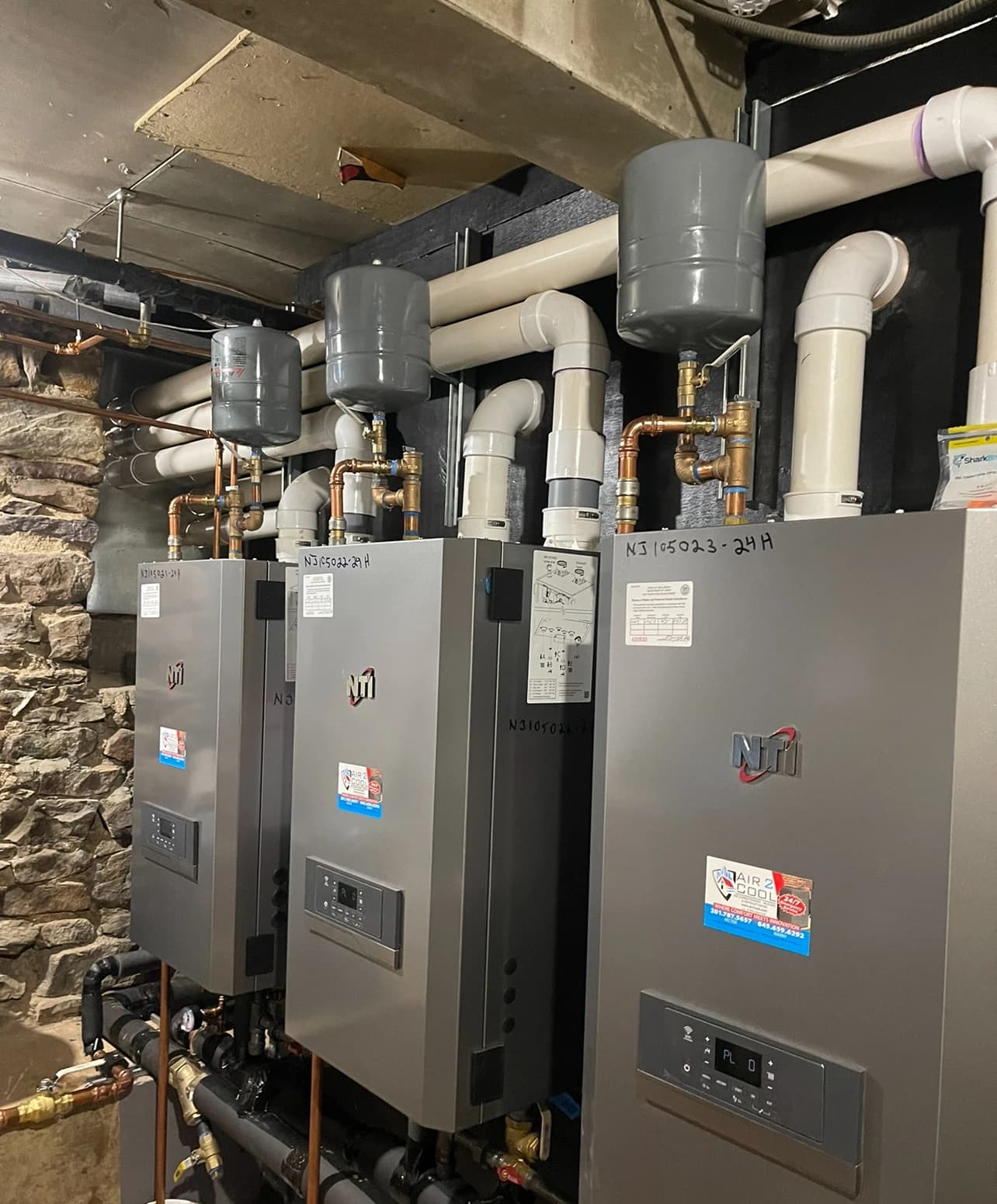 NTI wall hung boiler installation with primary secondary piping — Air2Cool NJ